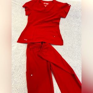 Scrubs- Grey’s anatomy signature by Barco set in red (medium)